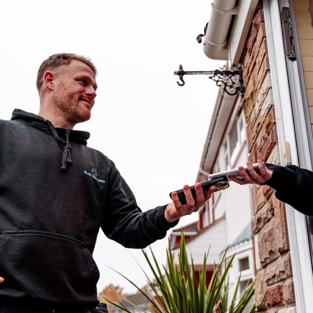 UK tradesperson using Powered Now job management app