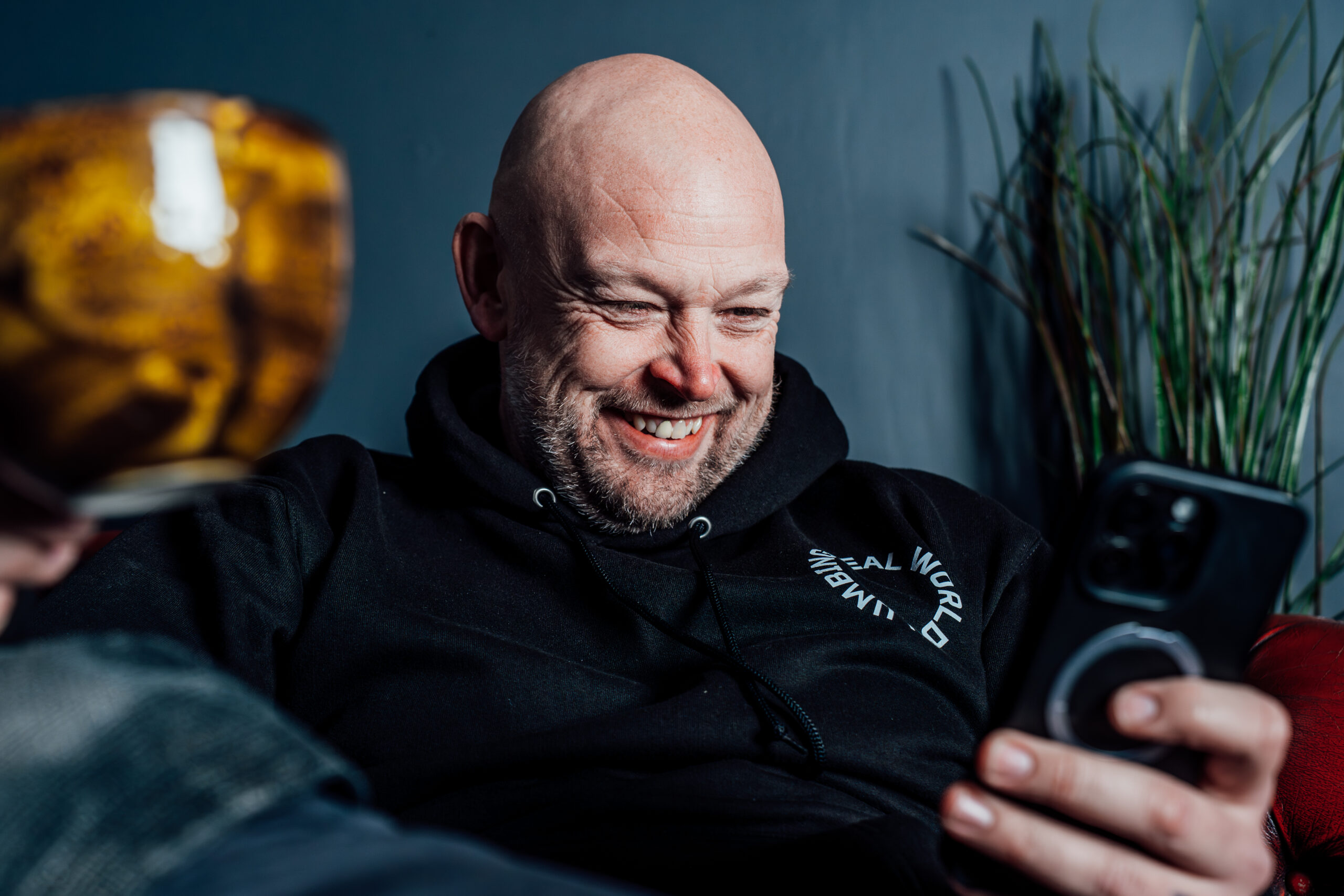 Heating engineer checking the team job schedule in the Powered Now diary