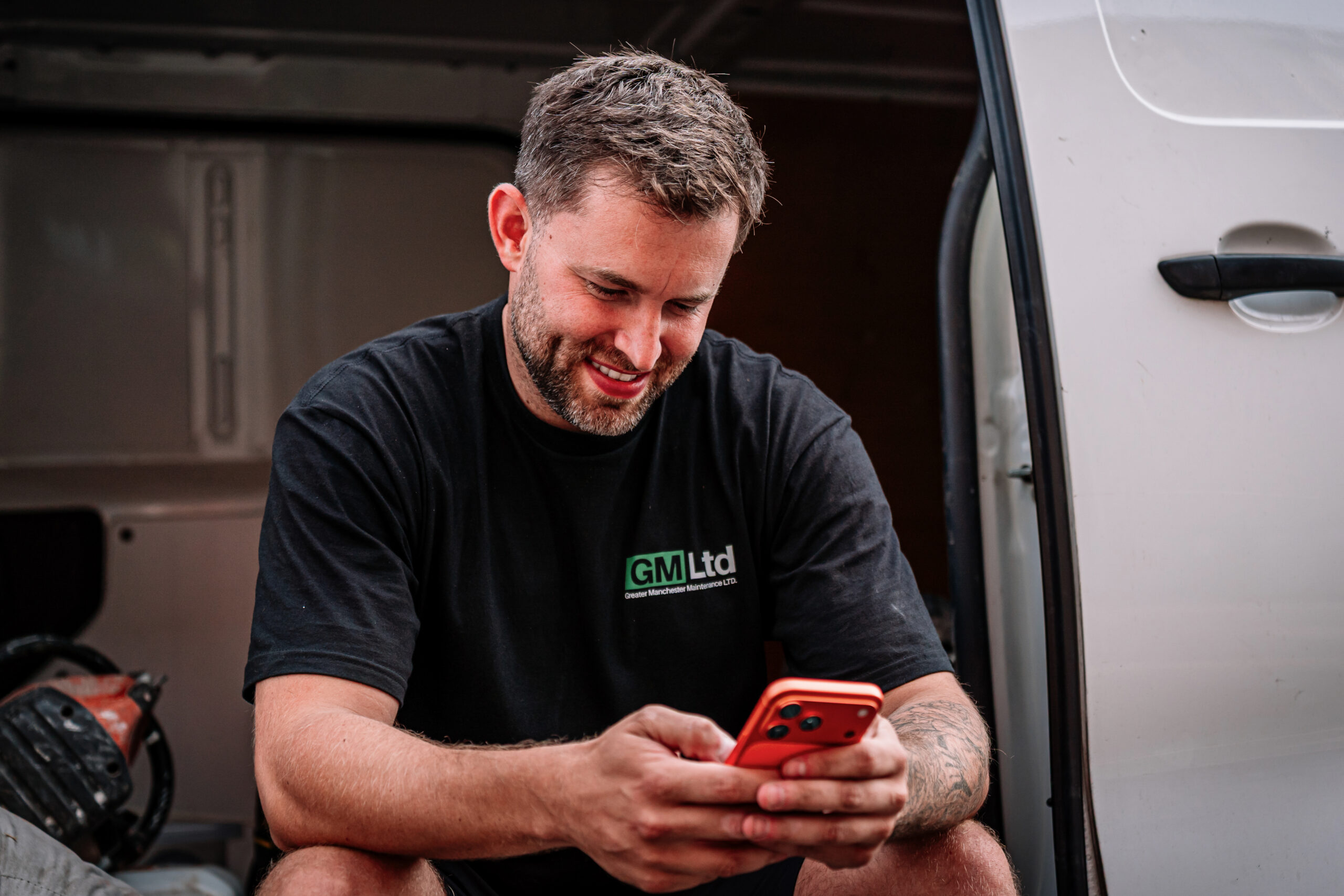 Electrician sending a branded quote from the Powered Now app on site